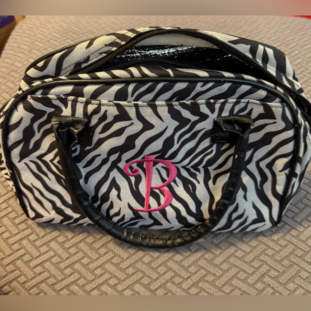 Travel Cosmetic Bag with Zebra Print / B Monogram. Rubbing on handles see pics